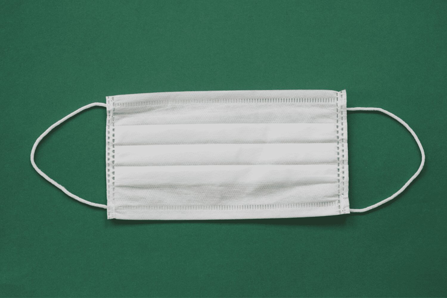face mask on a green background