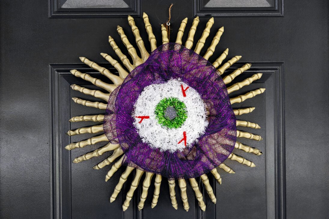 skeleton hand wreath on a door
